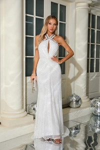 Detail of sequined white gown featuring a halter neck embellished with colorful rhinestones