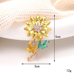 Luxury crystal sunflower brooch with yellow petals and green enamel leaf detail