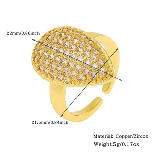 Detailed view of gold copper teardrop ring with dimensions and zircon material specs