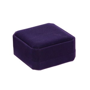 Detail of the octagonal dark purple velvet jewelry box with fine surface texture