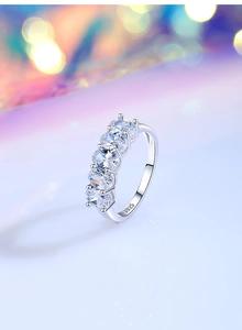 Detailed close-up of S925 sterling silver stamp and oval-cut zircon on the ring band