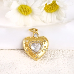 Macro shot of gold-plated shell heart pendant with micro-inlaid zircon and star patterns