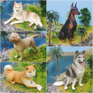 Detailed Labrador Shiba Inu Doberman and Husky dog figurine models on grass