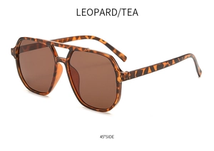 Detail of leopard print double bridge sunglasses with tea lenses from a side angle