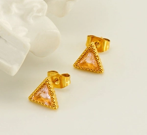 Detail of 18K gold stainless steel triangle earrings with pink zircon and micro-bead edges