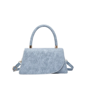 Fashionable light blue denim texture handbag with curved flap and top handle for women