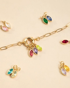 Close-up of 18K gold plated necklace with colorful marquise birthstone pendants