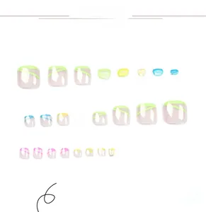 Detailed view of press-on toe nails featuring colorful diagonal stripes on translucent base