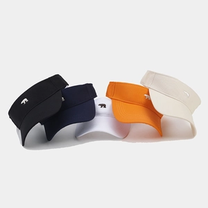 Detail of five colorful visor hats with polar bear embroidery in various vibrant colors