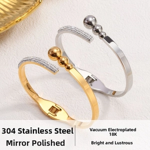 Detail of 18K gold plated 304 stainless steel open bangles with rhinestones