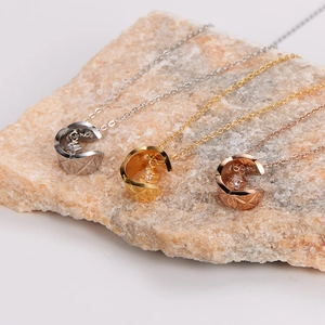 Minimalist stainless steel lattice moon necklaces in silver, gold, and rose gold colors