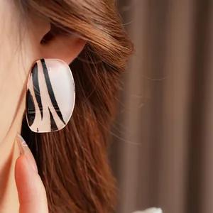 Retro oversized square leopard print earrings in black and white zebra pattern acrylic
