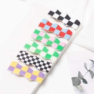 Colorful checkered wave hair clips for girls in various pastel and bold color patterns