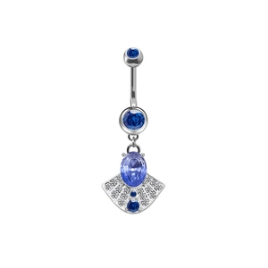 Macro detail of silver belly ring with blue gemstones and sparkling crystal accents