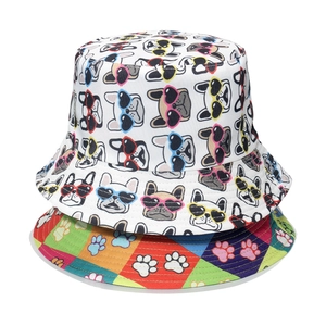 Reversible bucket hat with cute French Bulldog print and colorful paw patterns