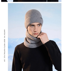 Detail of light grey winter knitted hat and neck gaiter set with soft fleece lining