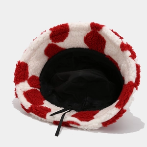 Winter plush bucket hat with red heart pattern and warm fleece lining for women