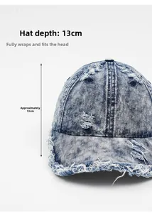 Detail view of washed denim baseball cap with raw edges and 13cm deep fit design