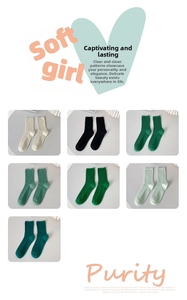 Detailed close-up of ribbed cotton crew socks in various shades of green and white