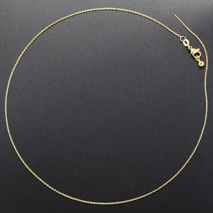 Detailed view of adjustable 18K gold-plated O-chain with lobster clasp and slider ball