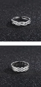 Detailed view of S925 sterling silver rings with cross design and brick texture finish