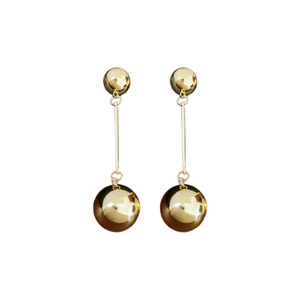 Minimalist gold metal ball tassel earrings with shiny spherical drop and thin bar design