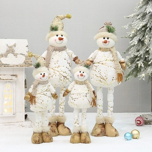Four-piece set of white plush snowman figurines with gold prints and knit scarves for Christmas