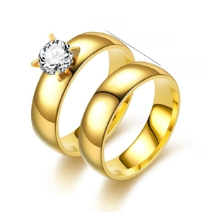 Detailed view of 18K gold plated stainless steel couple rings with 6mm width and zircon