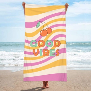 Rectangle beach towel with pink and yellow wavy stripes and Good Vibes cherry design