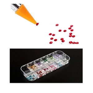 Nail art dotting tool picking up a red rhinestone from a 12-grid colorful gem organizer