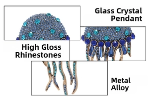 Detailed view of jellyfish brooch with blue crystals and vintage bronze alloy tassels