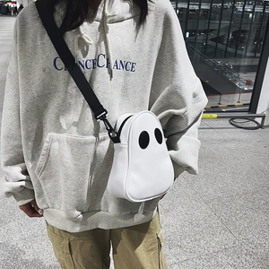 Ghost-shaped white PU leather crossbody bag with black eye detail and adjustable strap