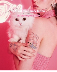 Colorful Y2K cat temporary tattoos applied on arm featuring cute cartoon kittens