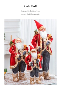 Detailed trio of Santa Claus dolls in red and grey, varying sizes for festive indoor decor
