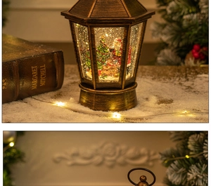 Detail of vintage bronze Christmas lantern featuring Santa scene and LED glitter snow
