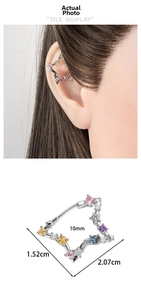 Detail of star-shaped silver hoop earring with multi-colored zircons and size specifications