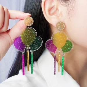 Sparkly acrylic balloon earrings with colorful glitter in purple, gold, and green