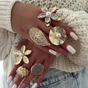 Chic 18K gold plated flower and pearl statement ring set worn by model on white sweater