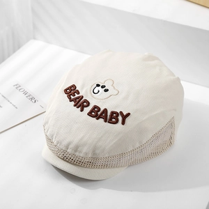 Detail of baby mesh beret with bear embroidery and breathable fabric for toddlers