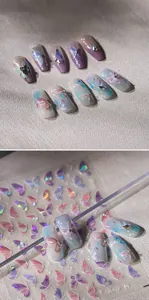 Macro shot of M-470 laser butterfly nail stickers with 3D rhinestones on gradient nails