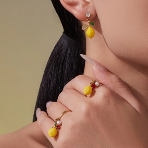 18k gold plated lemon pendant earrings and ring set with zircon accents on model