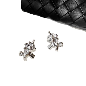 18k gold plated unicorn stud earrings with sparkling cubic zirconia on white background
