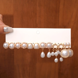 12-piece set of vintage baroque style earrings with pearls and crystals in golden finish