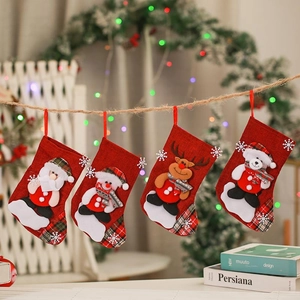 Set of 4 festive red Christmas stockings featuring Santa, snowman, elk, and bear characters