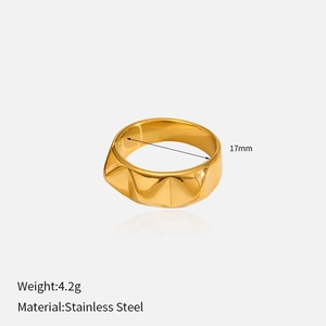 Detail view of golden irregular steel ring with 17mm inner diameter and 4.2g weight