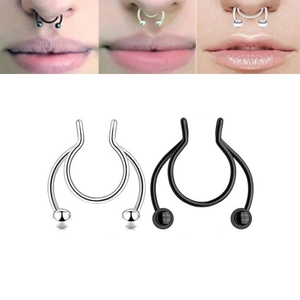 Detailed view of U-shaped non-pierced magnetic nose rings in silver and black finishes