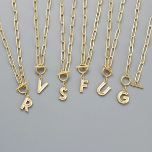 Gold plated initial necklaces with large paperclip chains and T-bar toggle closures