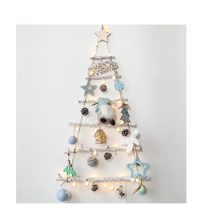 Wall-mounted wooden Christmas tree with LED lights, pine cones and plush ornaments