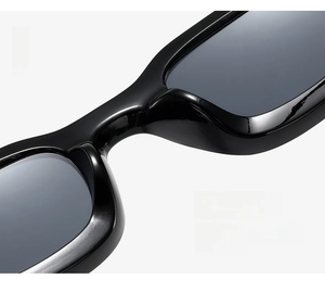 Close-up of integrated black resin nose pads on fashion sunglasses for comfort