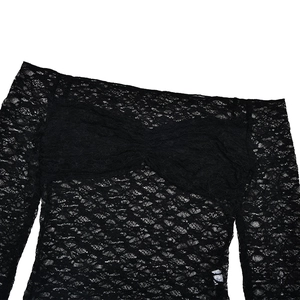 Close-up detail of sheer black lace texture and off-shoulder design on slim long sleeve top